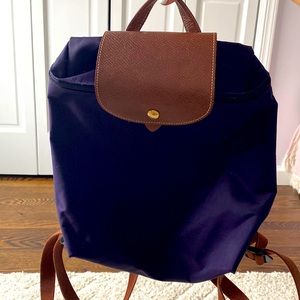 LongChamp Le Pliage Backpack in the color purple